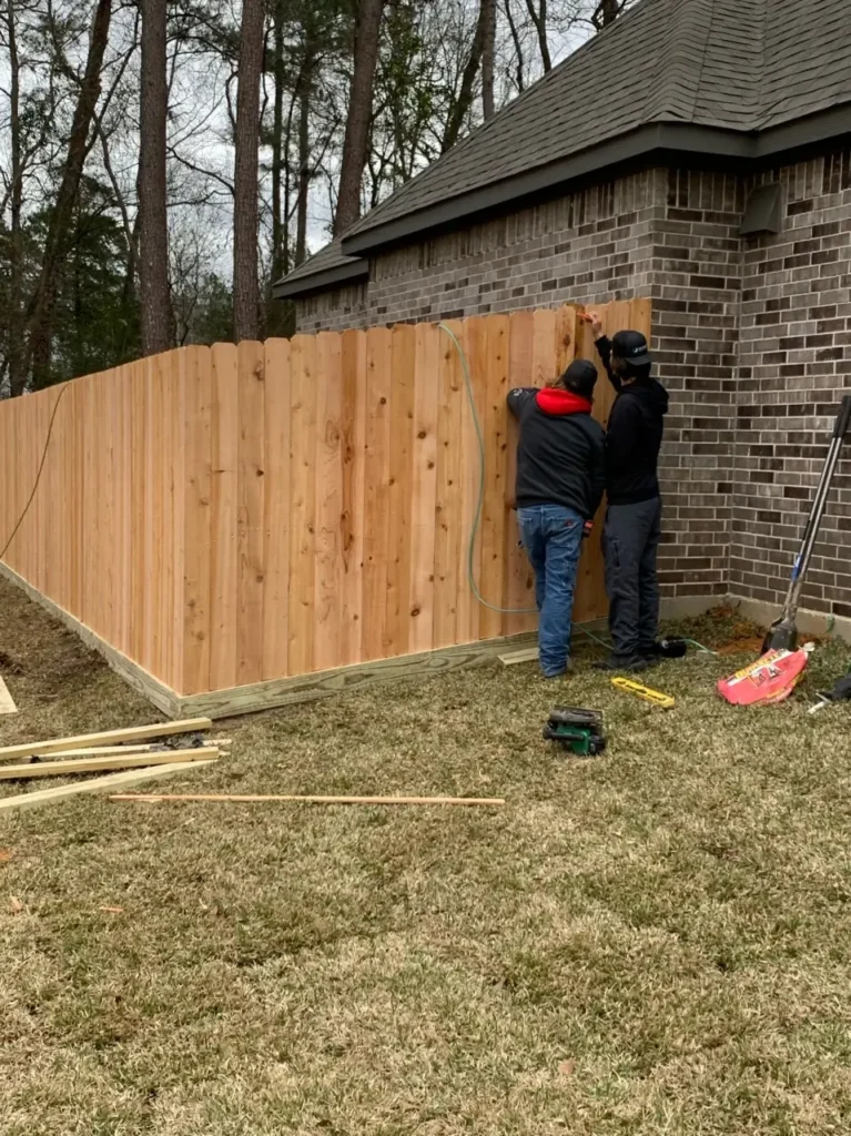 Builders Cromwell team installing wooden fencing for Fencing Cromwell.